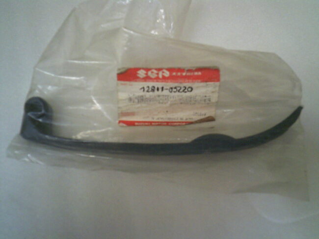 12811-05220-000 Patin tendeur neuf SUZUKI 125 DR/ TU / GN